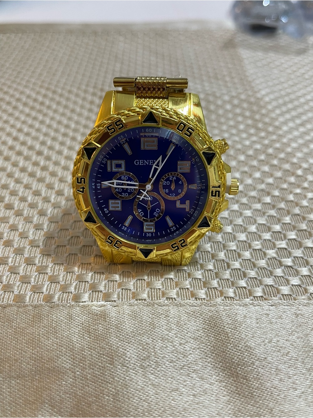 Geneva Gold Tone Watch with Blue Dial and Black Accents